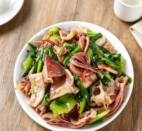 Fresh cleaned squid with a glossy pinkish-white finish